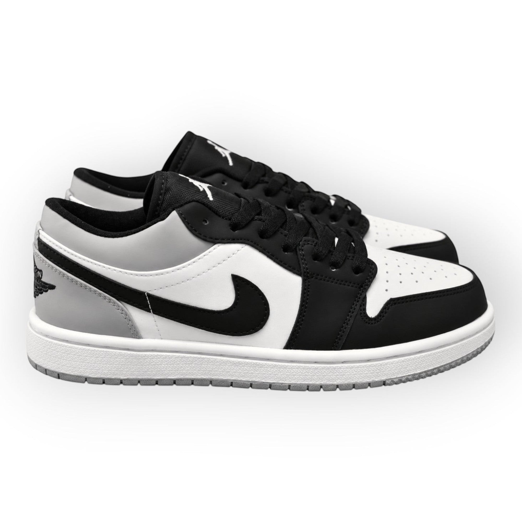 Nike Jordan  Retro 1 Low Ngo/Bco/Plata