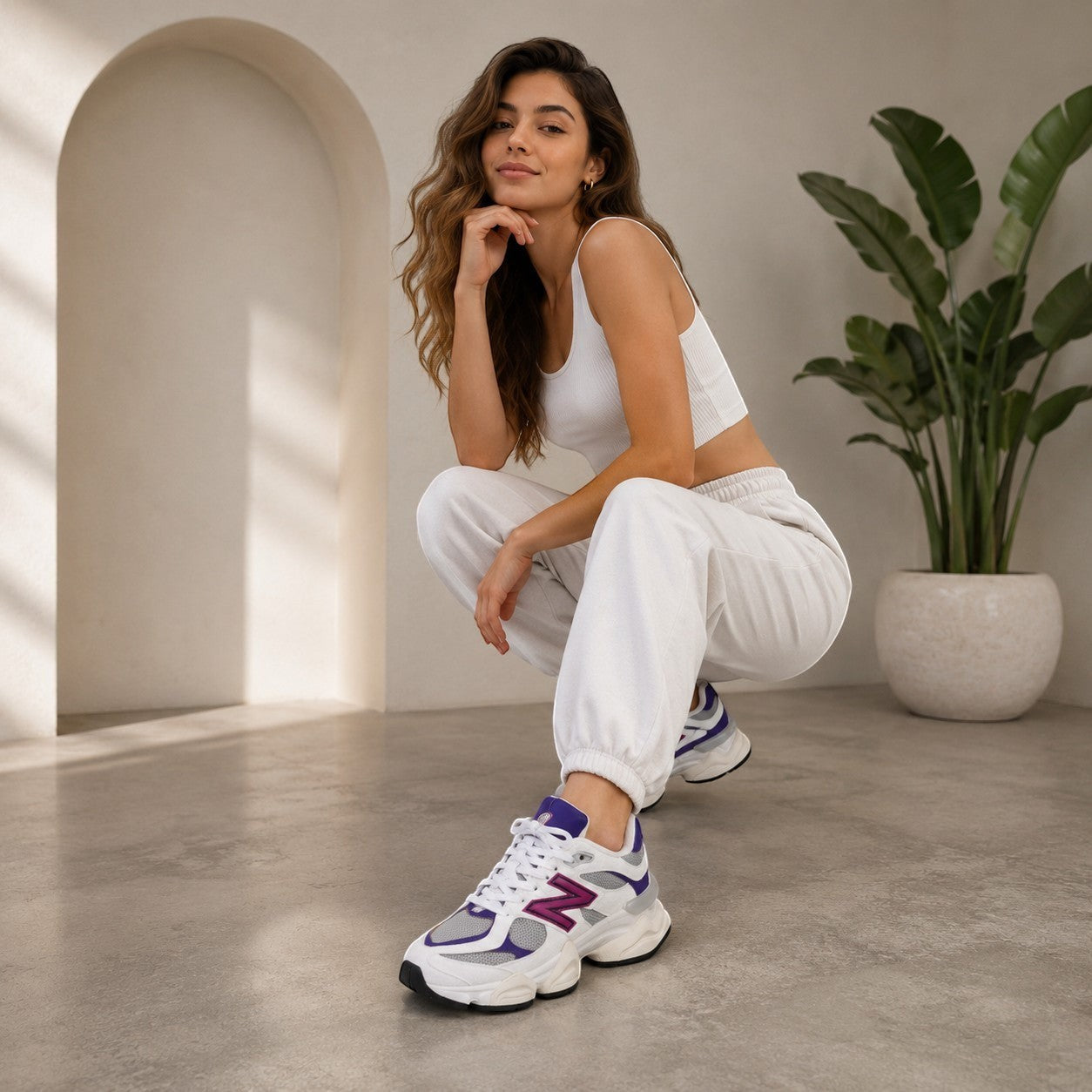 Zapatillas New Balance 9060 de Planet Shoes Sneakers en blanco roto con detalles morados y fucsia, malla y ante.